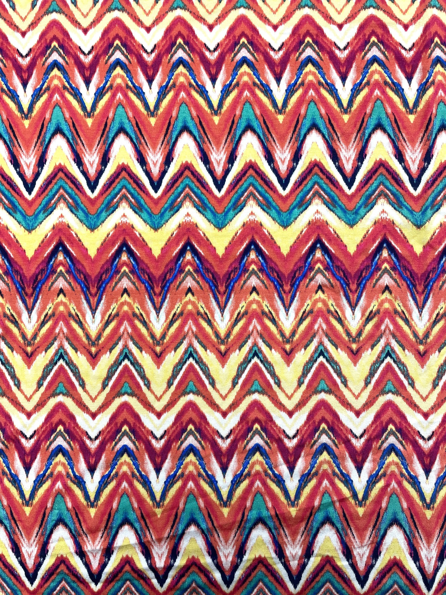 7/8 YD Nylon Stretch Knit Remnant- Multi Warm-Colored Zig Zags