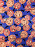 1 YD Quilting Cotton - Jack-o-Lanterns and Bats on Purple Background