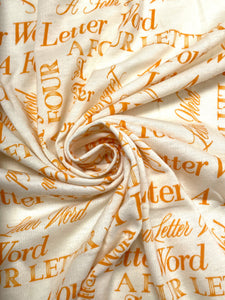 3 YD Poly/Cotton Knit - Off White with Tangerine Orange Lettering