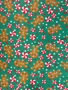 1 1/3 YD Polyester Polar Fleece - Gingerbread and Peppermints on Green Background