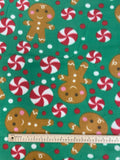 1 1/3 YD Polyester Polar Fleece - Gingerbread and Peppermints on Green Background