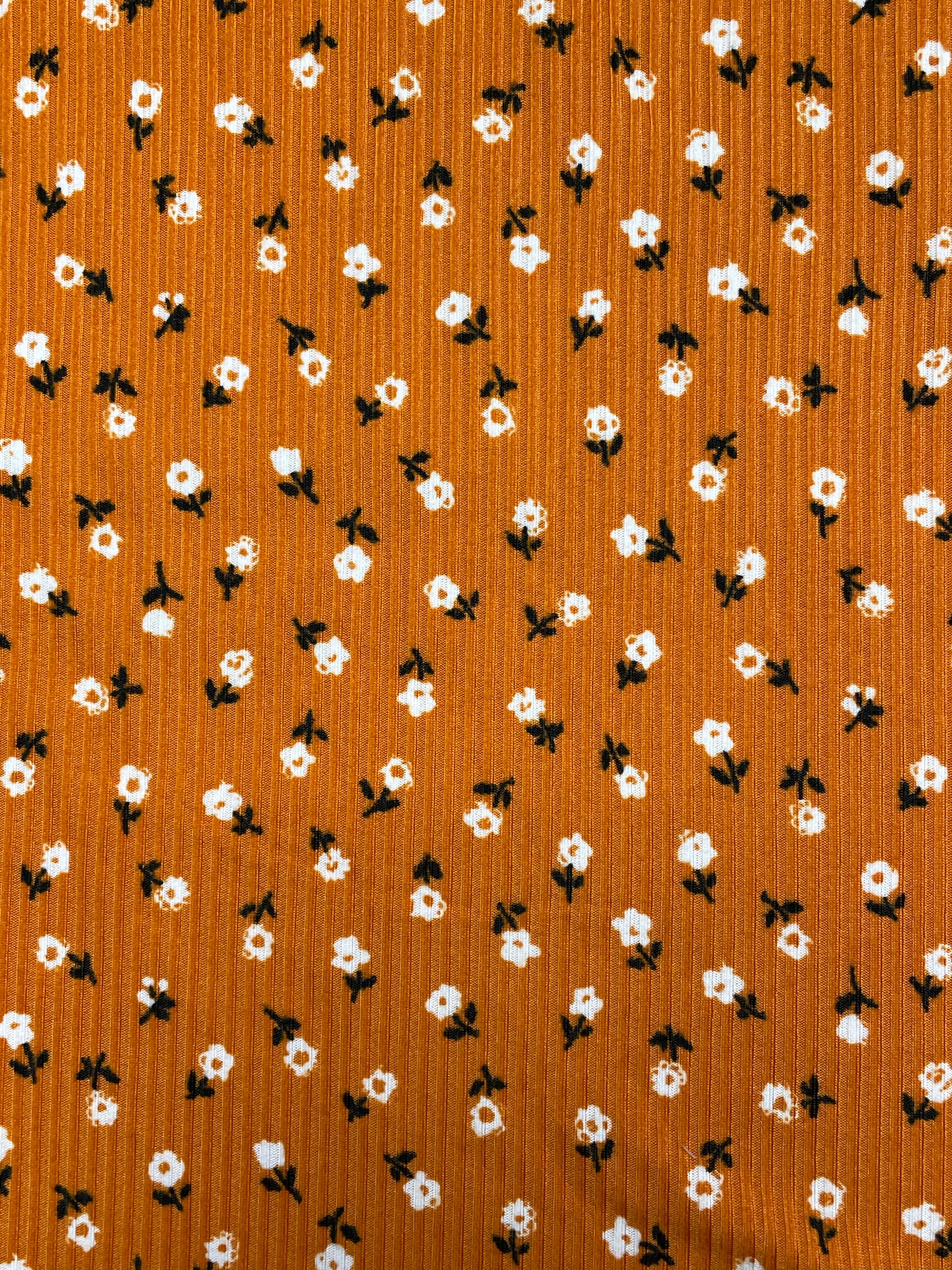 1 1/2 YD Synthetic Rib Knit - Burnt Orange with Flowers