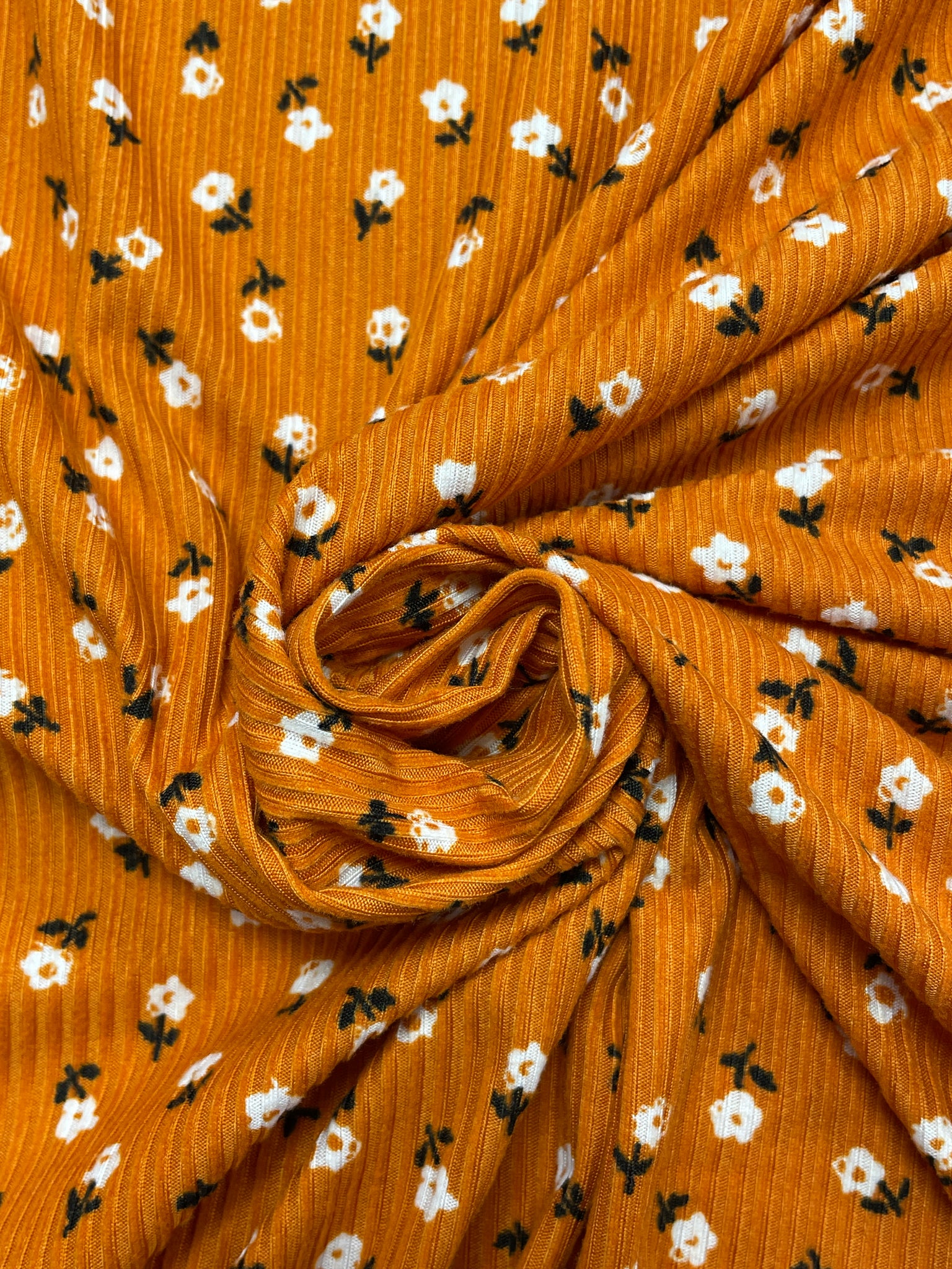 1 1/2 YD Synthetic Rib Knit - Burnt Orange with Flowers