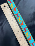 6 3/4 YD Polyester Ribbon - Turquoise with Woven In Dogs