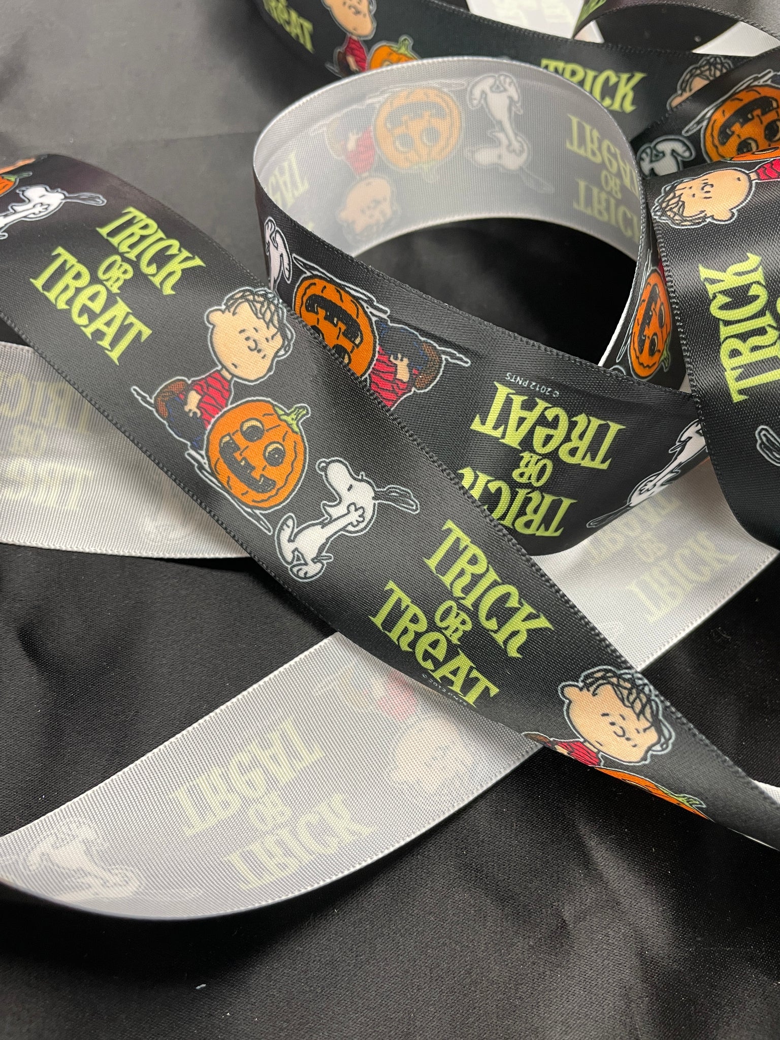 2012 3 YD Polyester Printed Satin Ribbon - Black with "Trick or Treat" and Peanuts Characters