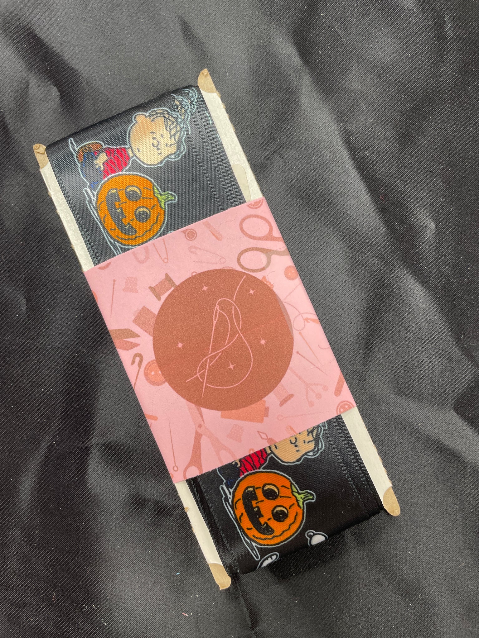 2012 3 YD Polyester Printed Satin Ribbon - Black with "Trick or Treat" and Peanuts Characters