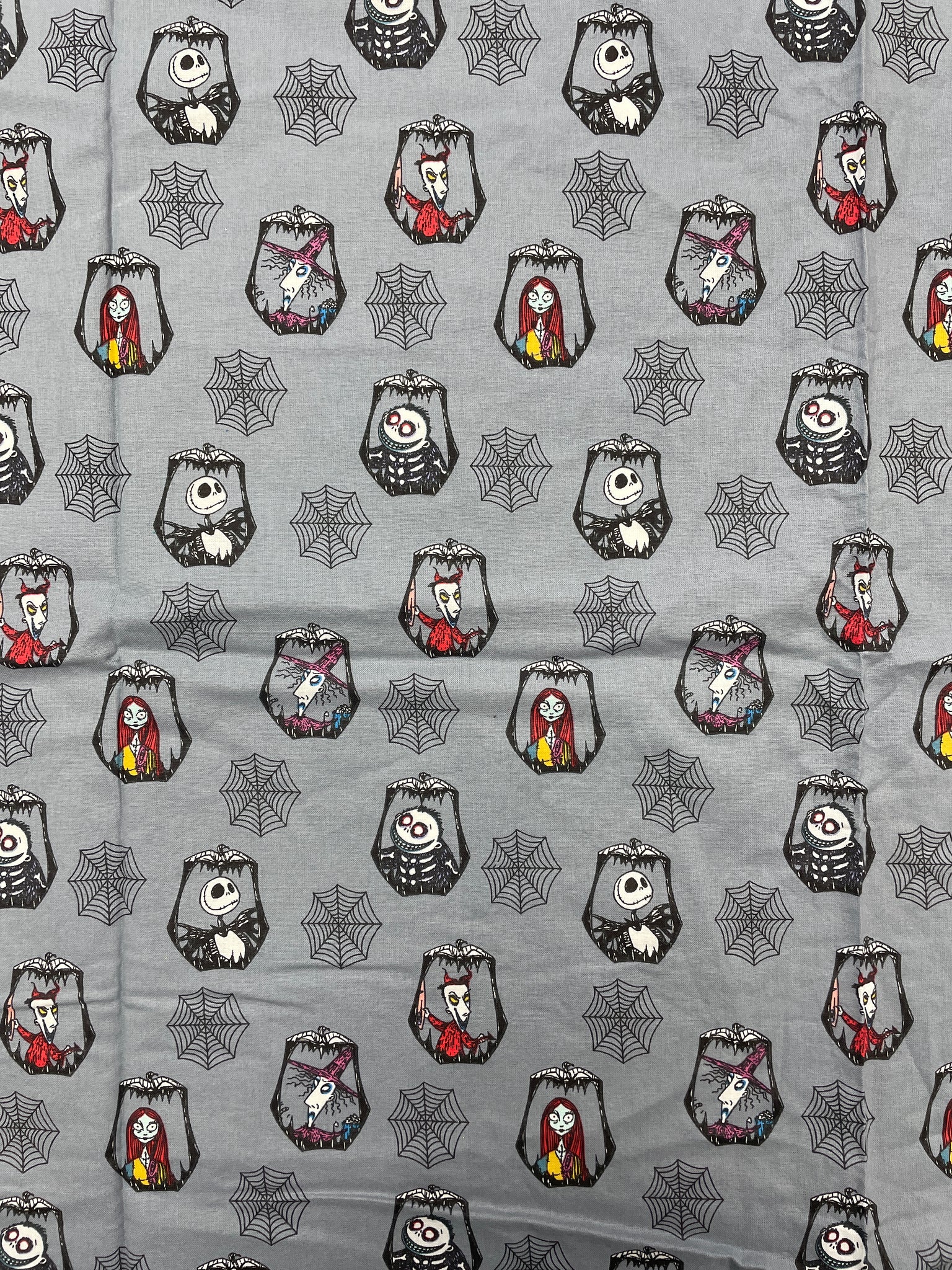 2020 2/3 YD Quilting Cotton Remnant - Gray with "Nightmare Before Christmas" Characters