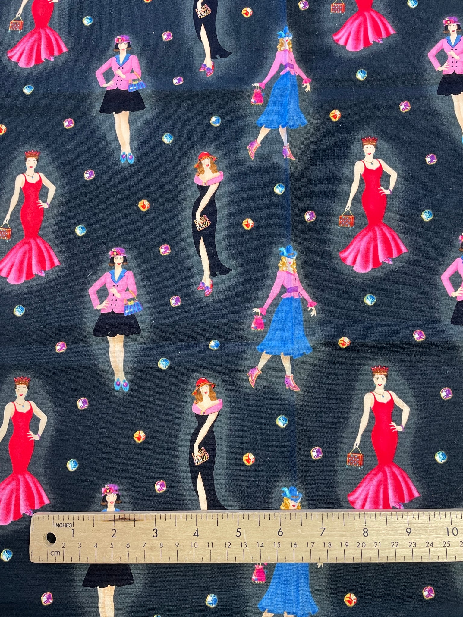 1 3/8 YD Quilting Cotton - Black with Women in Multicolored Outfits