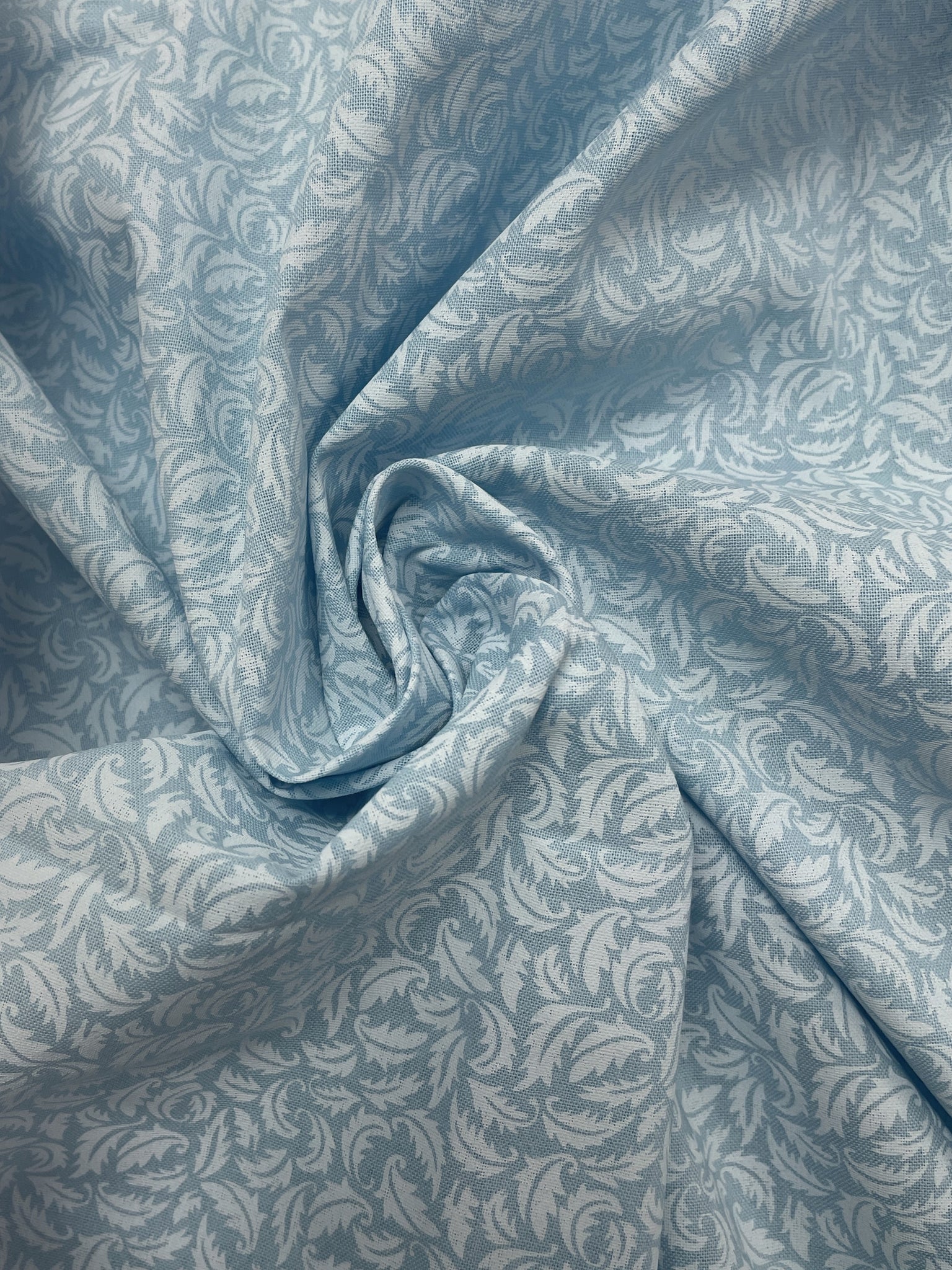 2 1/8 YD Quilting Cotton - Light Blue Printed with White Leaves