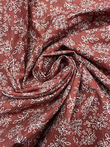 Quilting Cotton - Mottled Brick Red with Off White Leaves