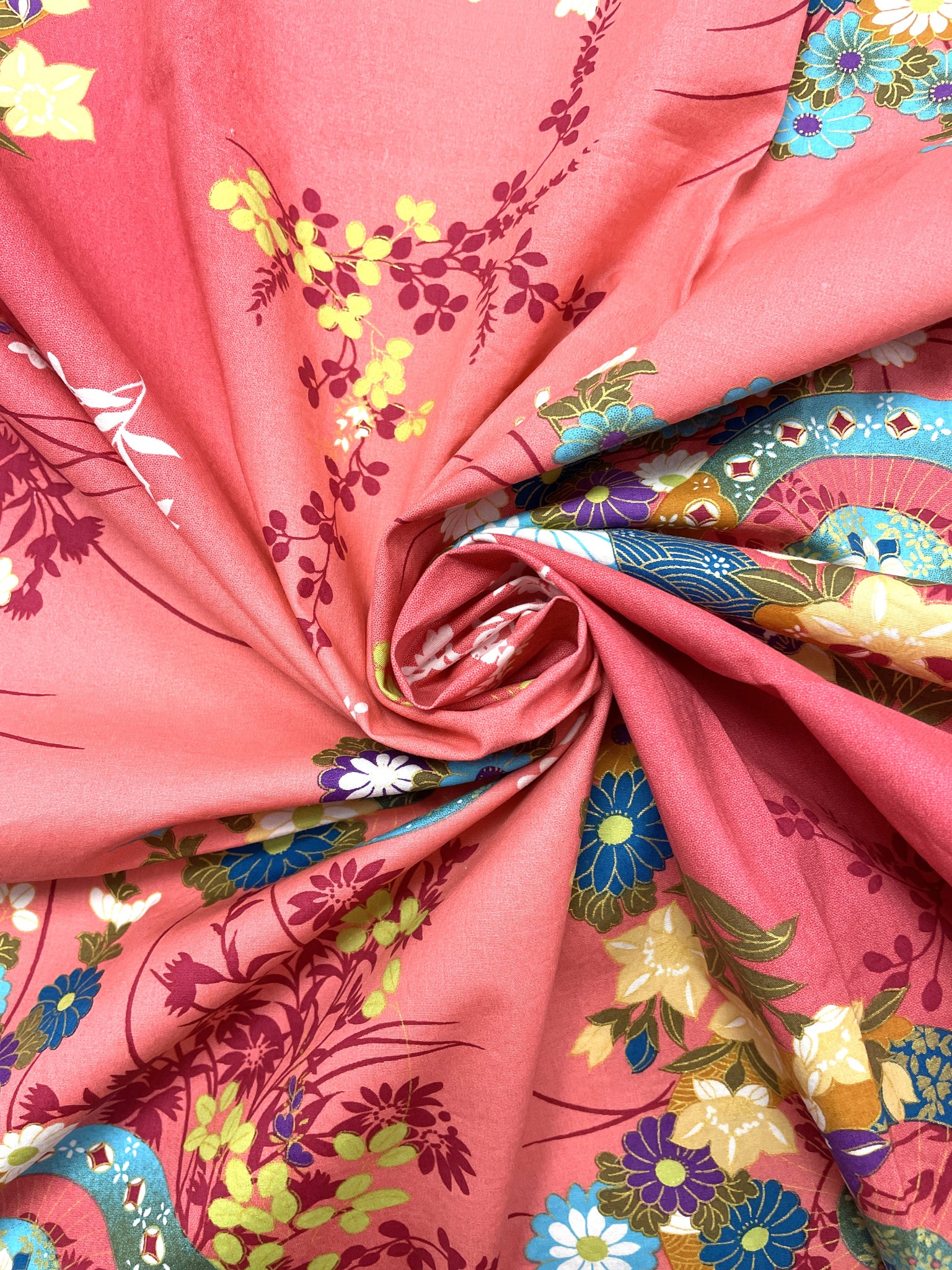 1 1/2 YD Cotton Stretch - Mottled Salmon Pink with Flowers and Subtle Metallic Gold Accents