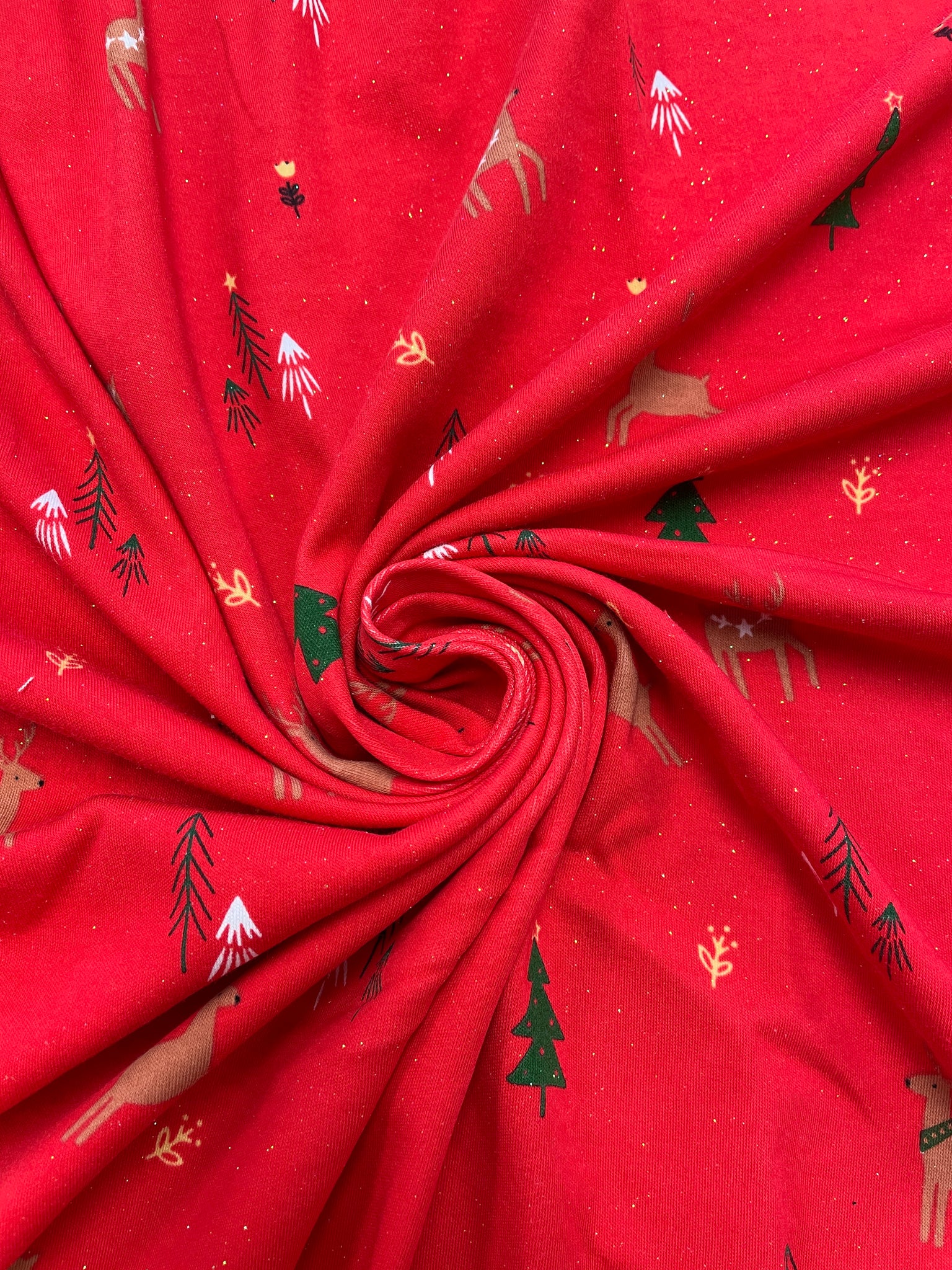 7/8 YD Cotton/Spandex Remnant - Red with Reindeer, Christmas Trees and Flowers