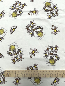 7/8 YD Cotton Knit Vintage - Off White with Barrels of Monkeys